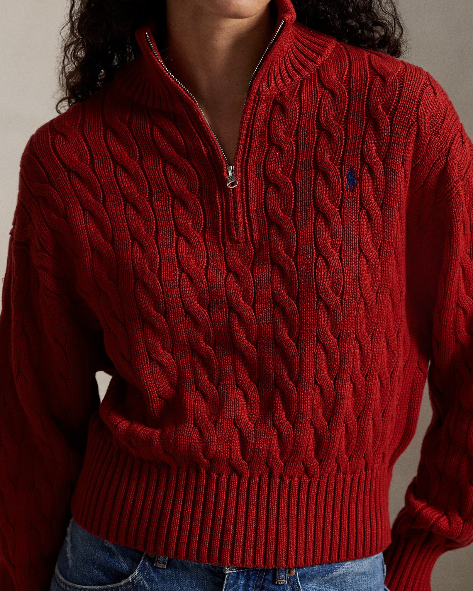 Suéter de algodão com trama trançada e zíper até o peito